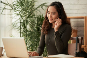 It shows a person wearing a headset, which represents customer service or chat support.