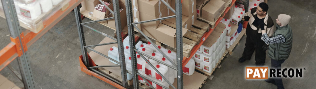 Warehouse worker is verifying the products