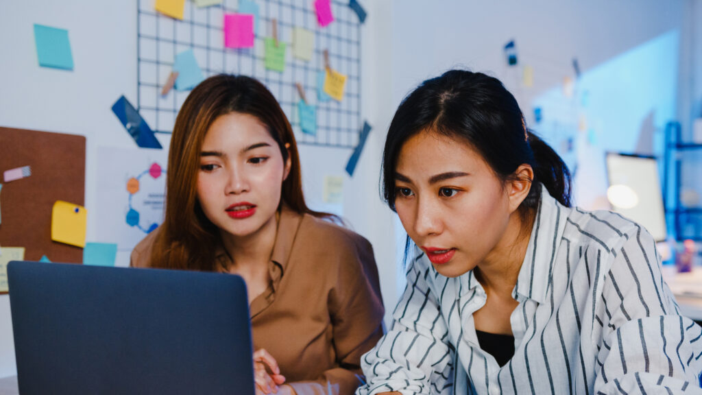 Group of Asia business people using Seo Services to increase website ranking