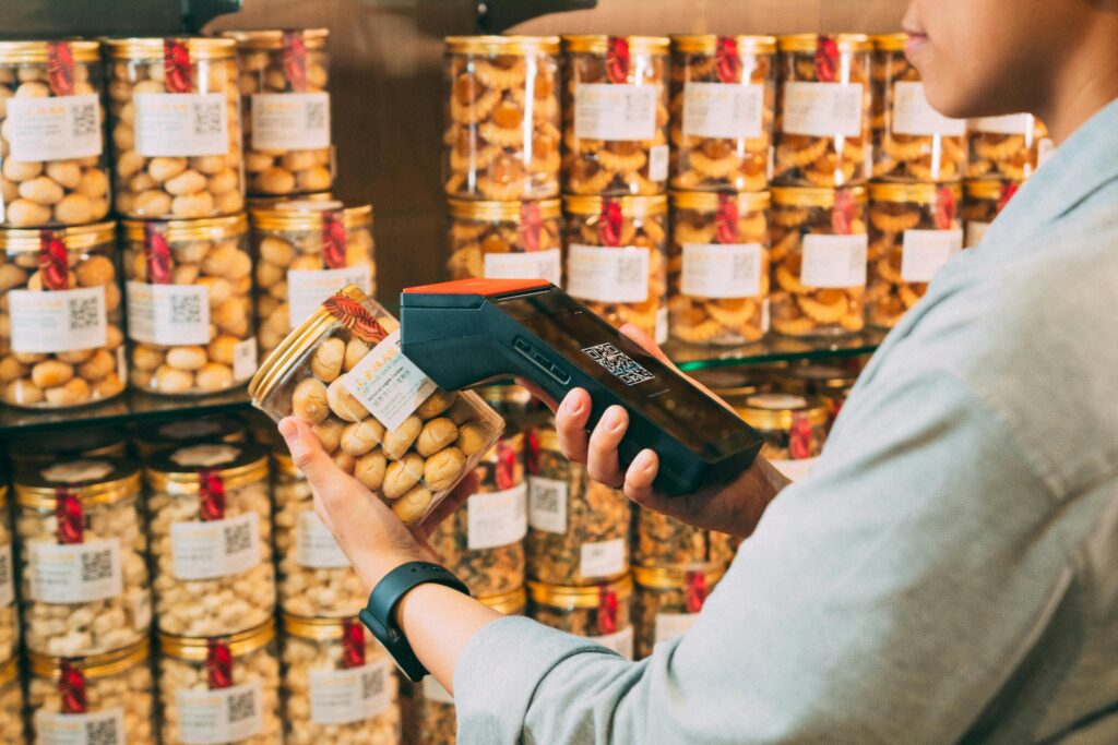 warehouse staff using pda scannning warehouse inventory