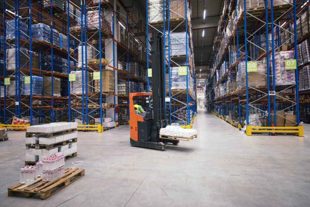 Industrial building large warehouse interior with forklift and palette with goods and shelves with Xilnex stock category
